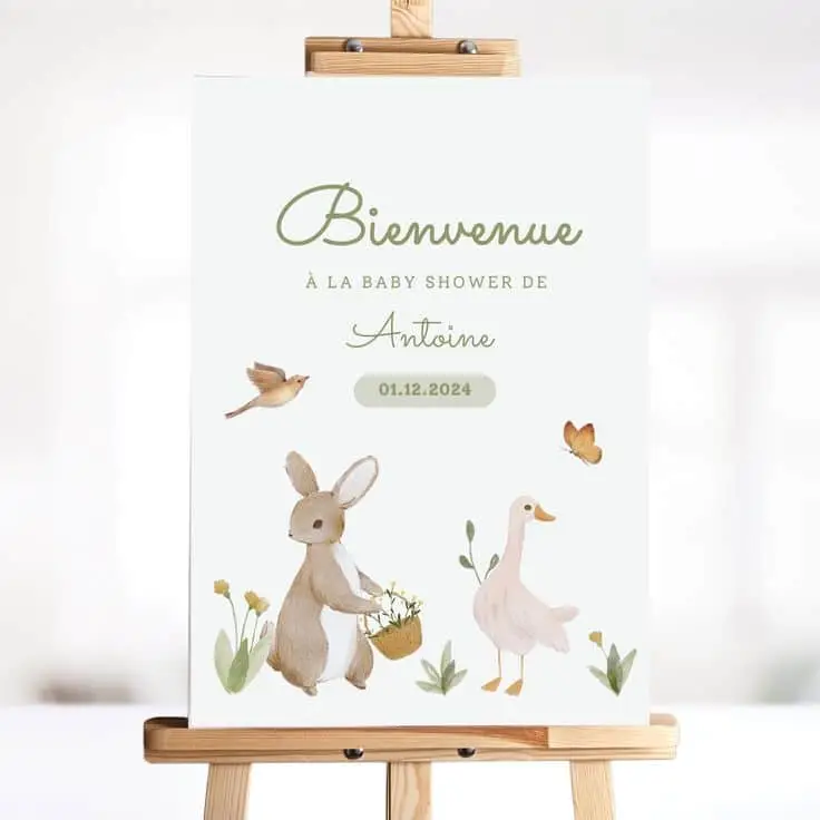 Panneau de bienvenue avec animaux et écriture verte, sur chevalet en bois
